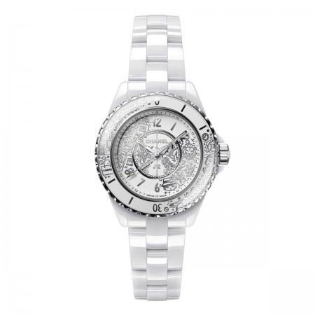 Montre Chanel J12 - création exclusive, tatouée de l’empreinte de CHANEL